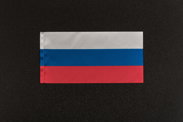 Flag of Russia on black background. National symbol of Russian Federation