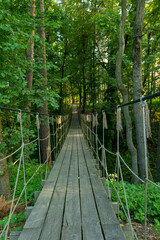 Obraz premium Suspension bridge, walkway to the adventurous, cross to the other side.