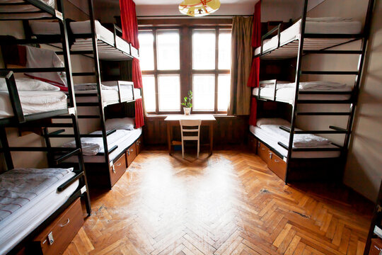 Small empty bedroom with bunk beds inside a room.