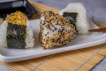 Onigiri, Japanese food, Japanese rice ball, rice triangle with seaweed.