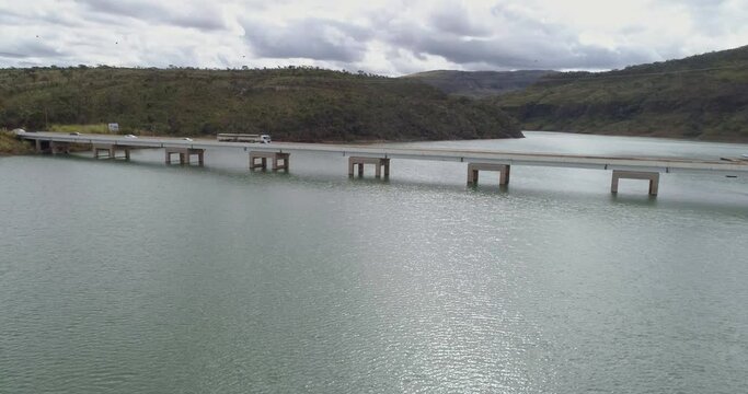 The meeting point for boat rides near the bridge over Rio Turvo river at the km 306 of MG-050 highway. Turvo bridge. Aerial view. 4K.