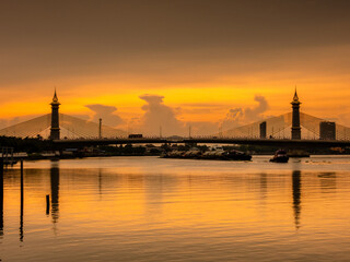Fototapeta na wymiar Times sunset over the bridge