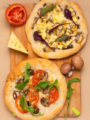 Vegetarian pizza with mushrooms, tomatoes and herbs. Ingredients.