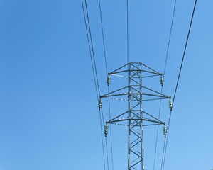 high voltage tower and a blue sky