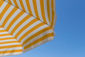 sunshade in front of blue sky