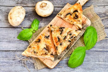  Mushroom italian  roman  style pizza.   Parmesan cheese,  cream, olives , , garlic, mushrooms,  tomato sauce 