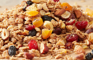 Granola (muesli) with oats, flax, almonds, chia seeds, hazelnuts, cashews and pumpkin seeds. Healthy organic food.