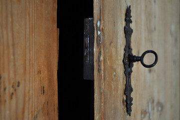 Door gap opened, antique wooden cabinet