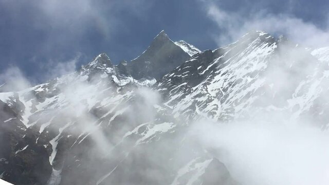 Footage video of Machhapuchhre mountain (Mt.Fish tail) with fog view from MBC, Nepal. Machhapuchhre mountain the holy mountains in Hindu religion believed it the rest place of God Shiva.