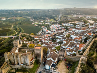 Aerial shoot of Obidos with historic walls and castle, Portugal