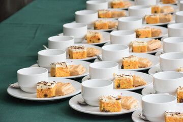 Coffee break at conference meeting. Set of coffee break arranged on the table.