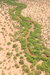 Aerial view of the Brown River in the Shompole conservancy area in the Great Rift Valley, near Lake Magadi, Kenya.