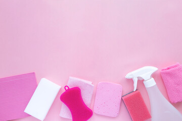 Detergents and cleaning products agent, sponges, napkins and rubber gloves, pink background. Top view. Copy space