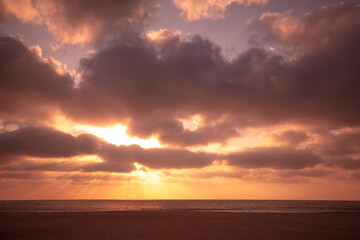 Naklejka na ściany i meble Seascape, sunset over the sea. Atlantic ocean in the evening. Beautiful nature