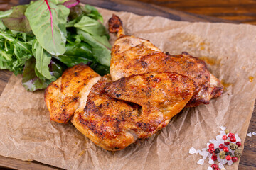 Grilled chicken with spices and fresh vegetables