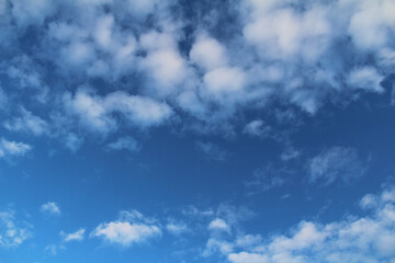 Fototapeta premium White clouds and blue sky as background. Photo of sky in sunny day. Nature background.