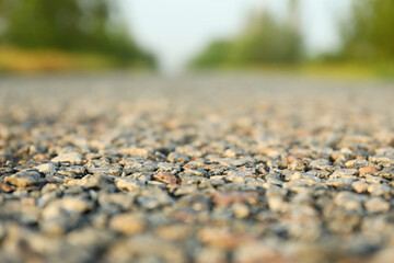 Asphalt road, close up. Summer morning. Travel concept