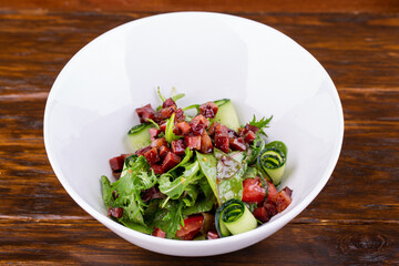 Salad with fried tuna and fresh vegetables
