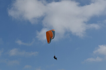 Paragliding at the beach of Katwijk aan Zee. Paraglider's making use of updraft of the dunes to stay in the air 