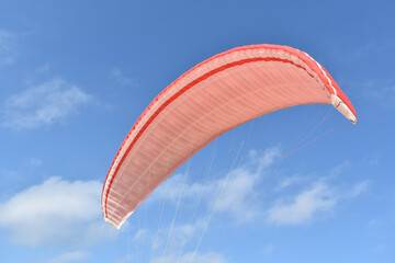Paragliding at the beach of Katwijk aan Zee. Paraglider's making use of updraft of the dunes to stay in the air 