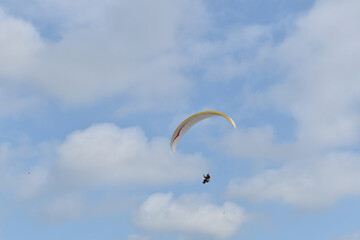 Paragliding at the beach of Katwijk aan Zee. Paraglider's making use of updraft of the dunes to stay in the air 