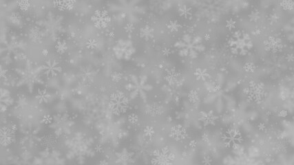 Christmas background of snowflakes of different shapes, sizes, blur and transparency in gray colors