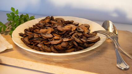 Close-up on a plate of cooked mushrooms