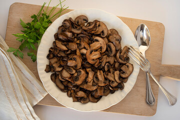 Close-up on a plate of cooked mushrooms