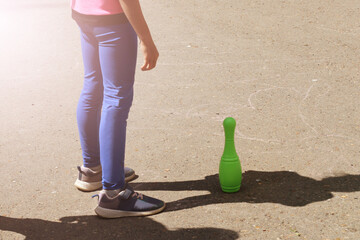 Children's feet and skittles at the stadium