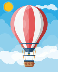 Hot air balloon in the sky with clouds and sun. Vintage air transport. Aerostat with basket. Flat vector illustration