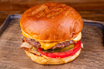 Classic burger with marble beef cutlet, onion, tomato and cheese