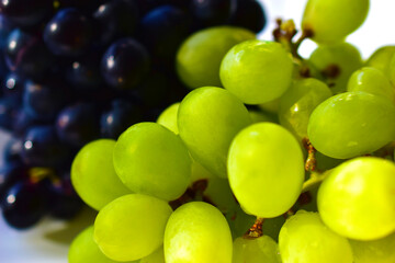 Black and green delicious fresh grapes macrophotography