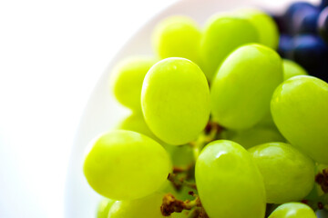 Black and green delicious fresh grapes macrophotography