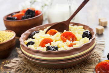 Millet porridge with dried fruits