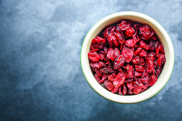 dried cranberries berries cherry sweet and healthy treat Menu concept serving size. food background top view copy space for text organic