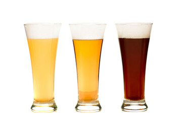 Cold beer in glasses in studio 