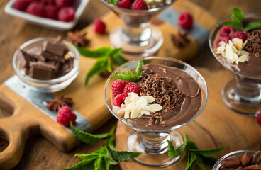 Chocolate mousse with raspberry, mint and almonds