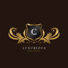 Golden C Logo Luxurious Shield, creative vector design concept for luxury brand identity.