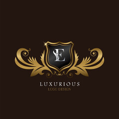 Golden E Logo Luxurious Shield, creative vector design concept for luxury brand identity.