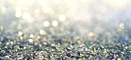 Defocus Abstract light blur blink sparkle horizontal backgound. Glitter shine dots confetti.