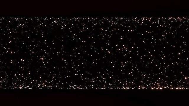 Beautiful glittering gold shimmering particles on black background. 3d Animation. 4K video