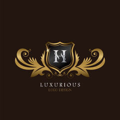 Golden H Logo Luxurious Shield, creative vector design concept for luxury brand identity.