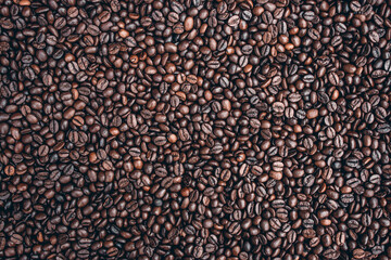 a heap of black coffee beans