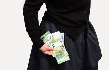 female hand holds euro pocket white background money