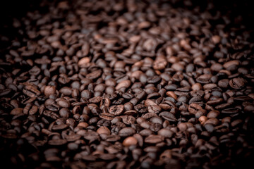 a heap of black coffee beans