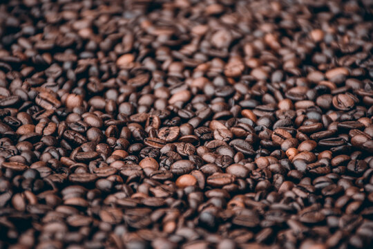 a heap of black coffee beans