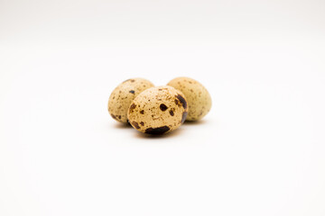 Food: group of quail eggs, isolated on white background