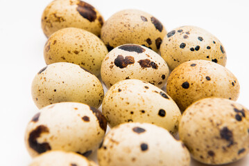Food: group of quail eggs, isolated on white background