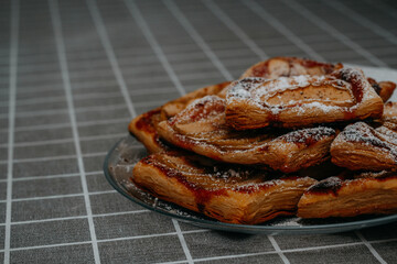 puff pastry puffs with Apple, cinnamon and powdered sugar