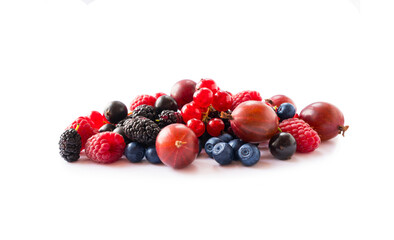 Fruits, berries isolated on white background. Fruits and berries with copy space for text. Currant, blueberry, goseberry, mulberry, raspberry. Mixed berries isolated on white background.